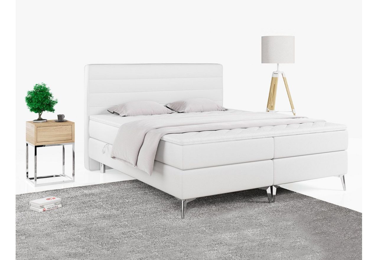 Wygodne łóżko kontynentalne z białą tapicerką z ecoskóry i chromowanymi, metalowymi nogami EKORE 120x200