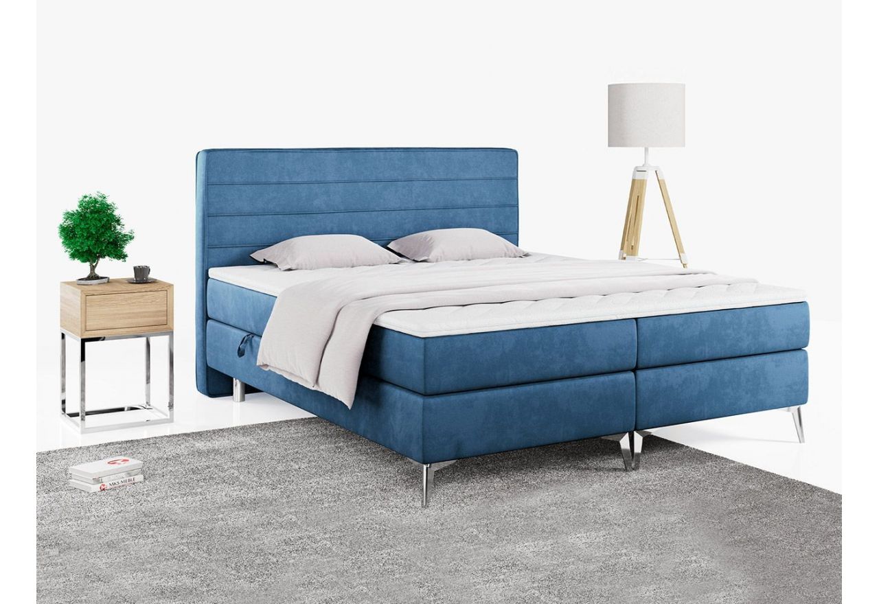 Niebieskie łóżko kontynentalne z wygodnym materacem sprężynowym i wysokim zagłówkiem EKORE 120x200