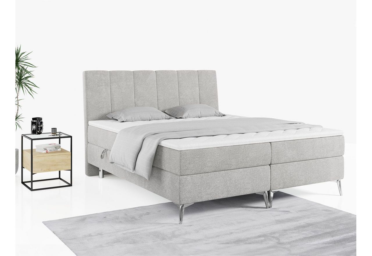 Wygodne łóżko kontynentalne ADELANO z wysokim wezgłowiem, szarą welurową tapicerka i dwoma materacami 120x200
