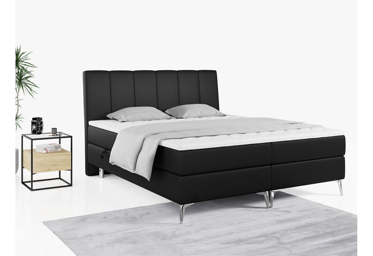 Czarne łóżko kontynentalne z ecoskóry ADELANO ze sprężynowym materacem i wysokim wezgłowiem 140x200