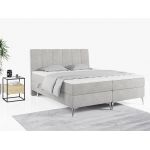 Wyposażone w dwa materace i wysokie wezgłowie łóżko kontynentalne ADELANO czarna ecoskóra 180x200