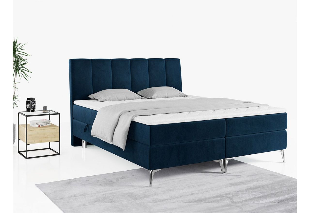 Wyposażone w dwa materace i wysokie wezgłowie łóżko kontynentalne ADELANO czarna ecoskóra 180x200