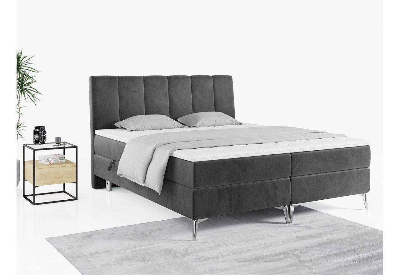 Wyposażone w dwa materace i wysokie wezgłowie łóżko kontynentalne ADELANO czarna ecoskóra 180x200