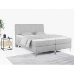 Wyposażone w dwa materace i wysokie wezgłowie łóżko kontynentalne ADELANO czarna ecoskóra 180x200