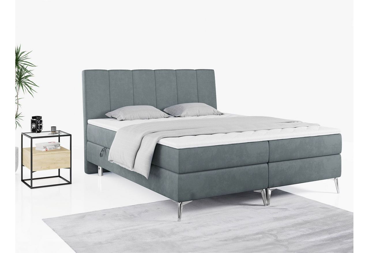 Wyposażone w dwa materace i wysokie wezgłowie łóżko kontynentalne ADELANO czarna ecoskóra 180x200