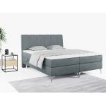 Wyposażone w dwa materace i wysokie wezgłowie łóżko kontynentalne ADELANO czarna ecoskóra 180x200