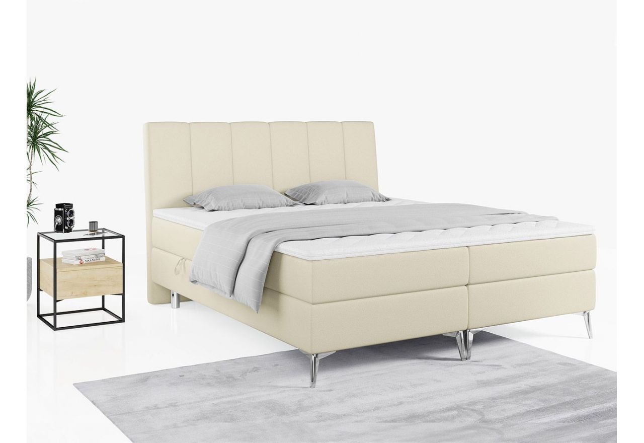 Wyposażone w dwa materace i wysokie wezgłowie łóżko kontynentalne ADELANO czarna ecoskóra 180x200