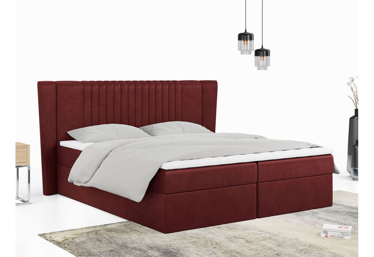 Czerwone łóżko kontynentalne z miękka welurową tapicerką, ozdobnym wezgłowiem i z dwoma materacami SEDICO 120x200