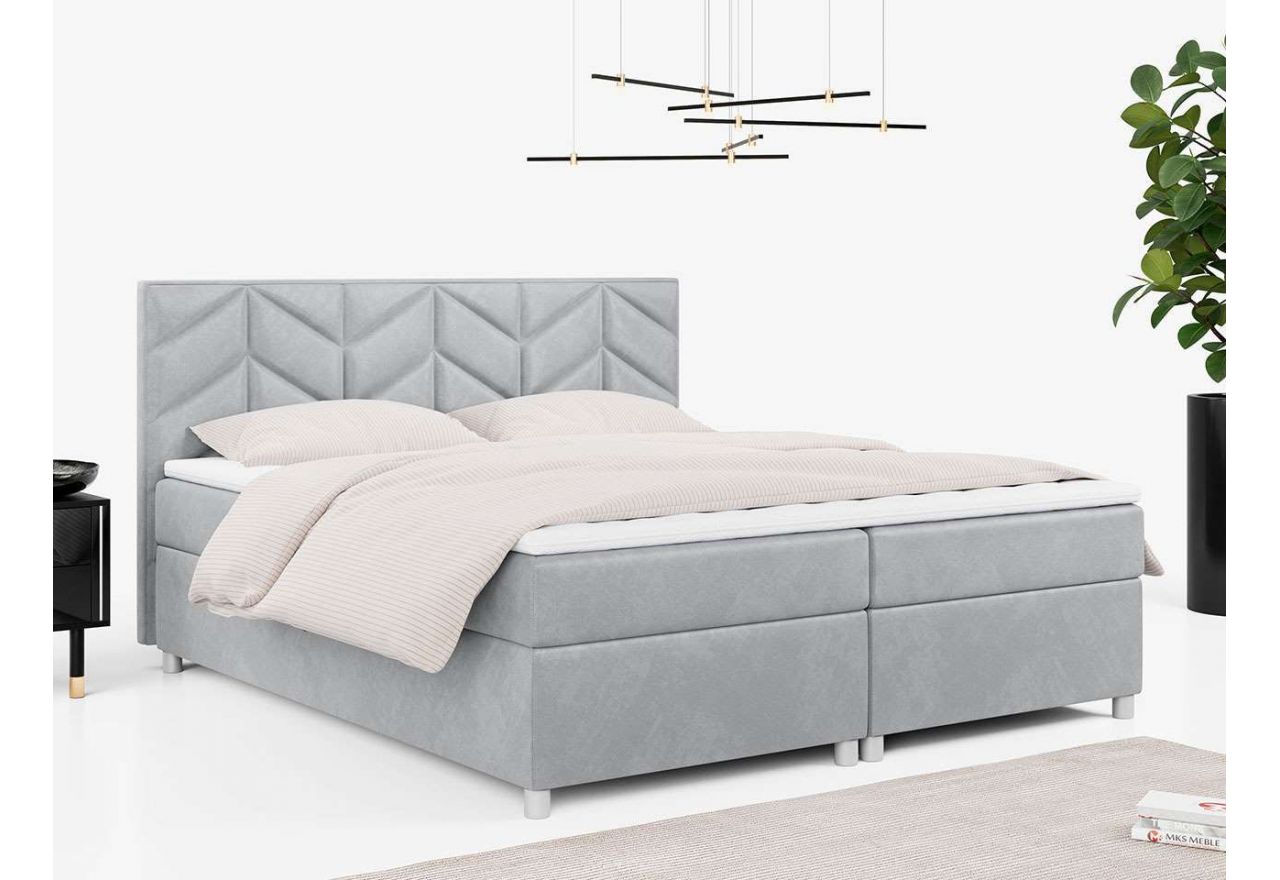 Szare łóżko kontynentalne pokryte welurową tkaniną, PINO 120x200 z dwoma materacami i wysokim zagłowiem